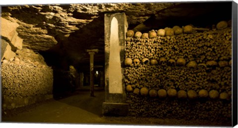 Framed Stacked bones in catacombs, Paris, Ile-de-France, France Print