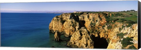 Framed Rock formations in the ocean, Lagos, Algarve, Portugal Print