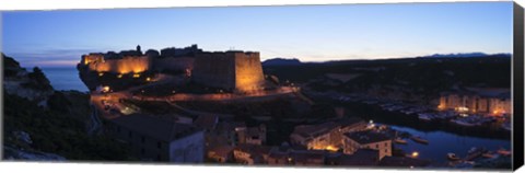 Framed Castle lit up at night, Bonifacio Harbour, Corsica, France Print