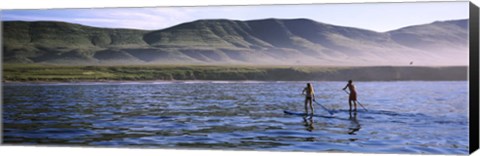 Framed Tourists paddleboarding in the pacific ocean, Santa Cruz Island, Santa Barbara County, California Print