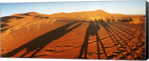 Framed Shadows of camel riders in the desert at sunset, Sahara Desert, Morocco Print