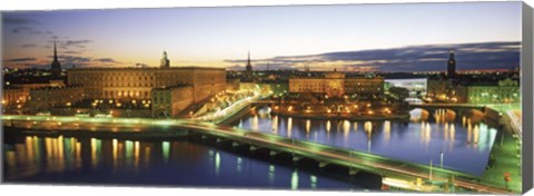 Framed Royal Palace and Parliament building lit up at dusk, Stockholm, Sweden Print