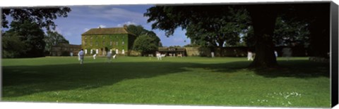 Framed Cricket match on the green at Crakehall, Bedale, North Yorkshire, England Print