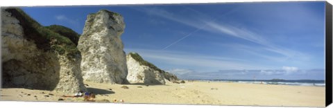 Framed Rock formations on the beach, White Rock Bay, Portrush, County Antrim, Northern Ireland Print