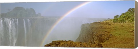 Framed Rainbow form in the spray created by the water cascading over the Victoria Falls, Zimbabwe Print
