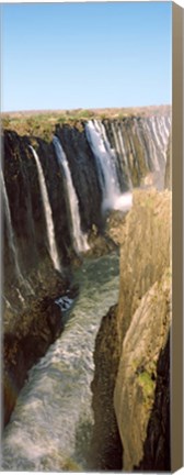 Framed Water falling through rocks in a river, Victoria Falls, Zimbabwe Print