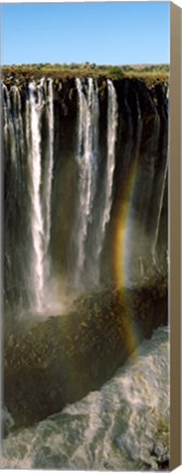 Framed Rainbow forms in the water spray in the gorge at Victoria Falls, Zimbabwe Print