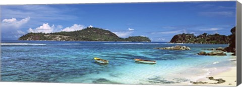 Framed Small fishing boats on Anse L&#39;Islette with Therese Island in background, Seychelles Print