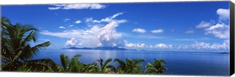 Framed Indian ocean with palm trees towards Mahe Island looking from North Island, Seychelles Print