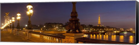 Framed Bridge across the river lit up at dusk, Pont Alexandre III, Seine River, Paris, Ile-De-France, France Print