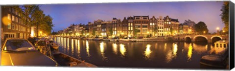 Framed Night view along canal, Amsterdam, Netherlands Print