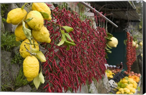 Framed Close-up of lemons and chili peppers in a market stall, Sorrento, Naples, Campania, Italy Print