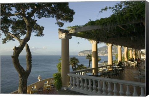 Framed Group of people sitting in a restaurant by the sea, Imperial Tramontano, Sorrento, Naples, Campania, Italy Print