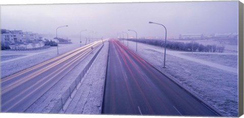 Framed Road running through a snow covered city, Reykjavik, Iceland Print