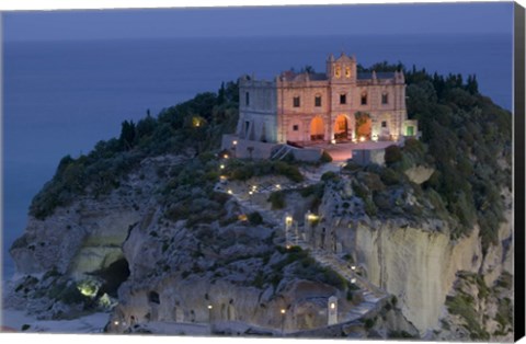 Framed High angle view of a church lit up at dusk on a cliff, Santa Maria dell Isola, Tropea, Calabria, Italy Print