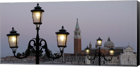 Framed Lampposts lit up at dusk with building in the background, San Giorgio Maggiore, Venice, Italy Print