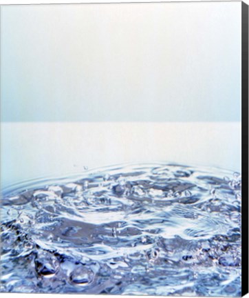 Framed Churning water bubbles in bright light Print