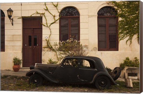 Framed Vintage car parked in front of a house, Calle De Portugal, Colonia Del Sacramento, Uruguay Print