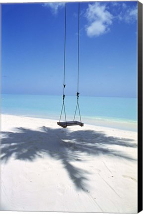Framed Swing on the beach above palm tree shadow Print