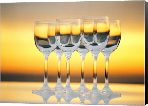 Framed Row Of Wineglasses Against Golden Yellow shiny Background Print