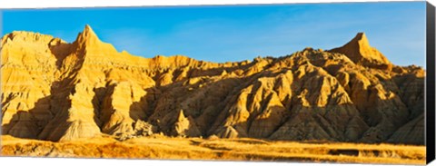 Framed Sculpted sandstone spires on a landscape, Saddle Pass Trail, Badlands National Park, South Dakota, USA Print