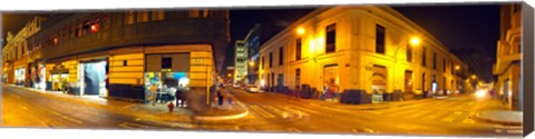 Framed Shops along a street at night, Lima, Peru Print