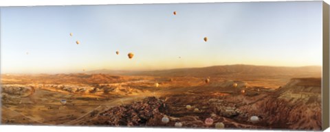 Framed Hot air balloons over a village in Cappadocia, Central Anatolia Region, Turkey Print