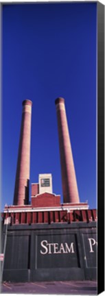 Framed Low angle view of two smoke stacks at Steam Plant Square, Spokane, Washington State Print