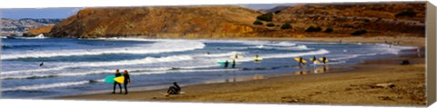 Framed Surfers on the beach, California, USA Print