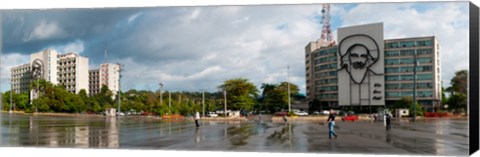 Framed Metal sculptures of Camilo Cienfuegos and Che Guevara on two buildings, Revolutionary Square, Vedado, Havana, Cuba Print