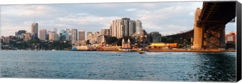 Framed Skyscrapers at the waterfront, McMahons Point, Sydney Harbor Bridge, Sydney Harbor, Sydney, New South Wales, Australia 2012 Print