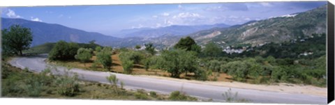 Framed Road passing through a landscape with mountains in the background, Andalucian Sierra Nevada, Andalusia, Spain Print