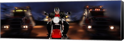 Framed Motorcycle rider between two semi trucks Print