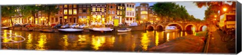 Framed Buildings along a canal at dusk, Amsterdam, Netherlands Print