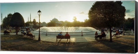 Framed People sitting at a fountain with Blue Mosque in the background, Istanbul, Turkey Print