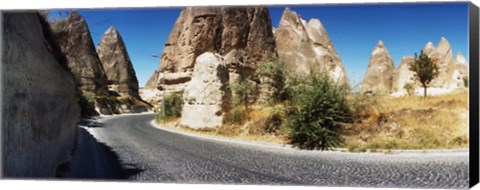 Framed Winding road passing through rocks, Cappadocia, Central Anatolia Region, Turkey Print
