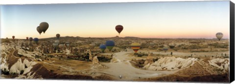 Framed Hot air balloons traversing Cappadocia, Central Anatolia Region, Turkey Print