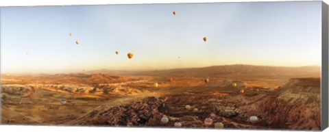 Framed Hot air balloons over a village in Cappadocia, Central Anatolia Region, Turkey Print