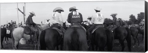 Framed Cowboys on horses at rodeo, Wichita Falls, Texas, USA Print