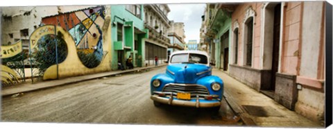 Framed Old car and a mural on a street, Havana, Cuba Print