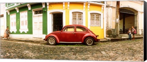 Framed Small old red car parked in front of colorful building, Pelourinho, Salvador, Bahia, Brazil Print