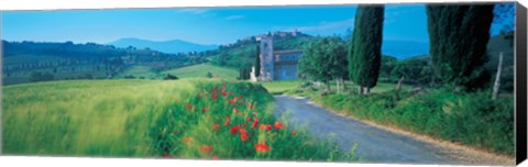 Framed Road passing through field Print