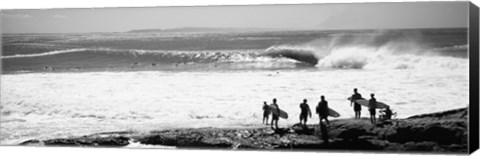 Framed Silhouette of surfers standing on the beach, Australia (black and white) Print
