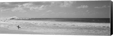 Framed Surfer standing on the beach in black and white, Oahu, Hawaii Print