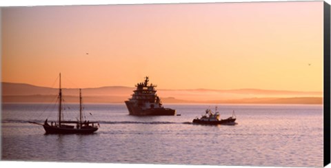 Framed Tugboat with a trawler and a tall ship in the Baie de Douarnenez at sunrise, Finistere, Brittany, France Print