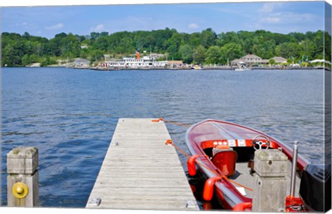 Framed Motorboat moored at a pier, Gravenhurst Bay, Gravenhurst, Ontario, Canada Print