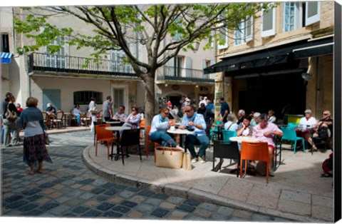 Framed Tourists at sidewalk cafes, Lourmarin, Vaucluse, Provence-Alpes-Cote d&#39;Azur, France Print