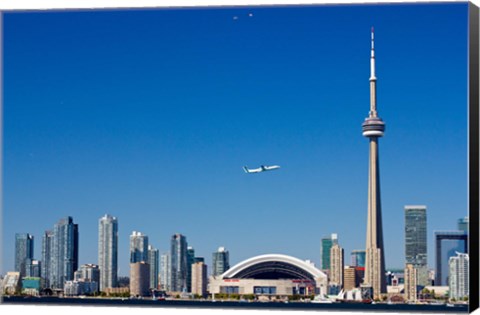 Framed Airplane over city skylines, CN Tower, Toronto, Ontario, Canada 2011 Print