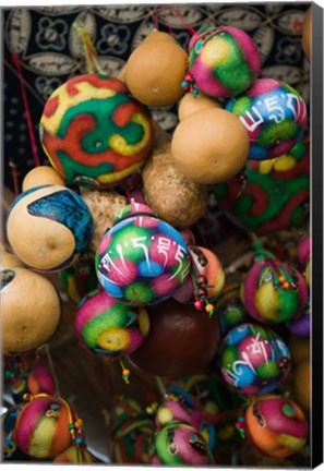 Framed Painted gourds for sale in a street market, Old Town, Lijiang, Yunnan Province, China Print