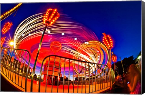 Framed Time exposure of a Carnival ride at night Print